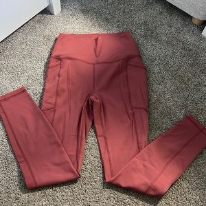 pink/salmon colored RBX leggings